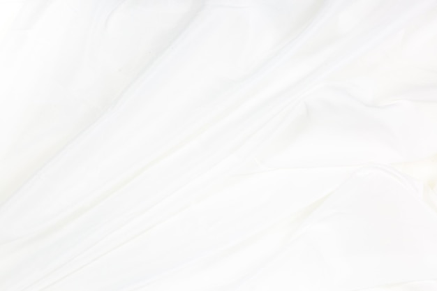 White cloth background abstract with soft waves