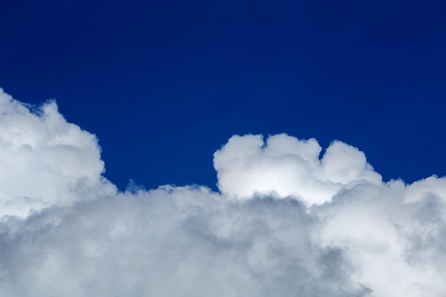 White cloud and blue sky at daylight Close shot wit telehoto lens and polarizing filter with minimalistic composition