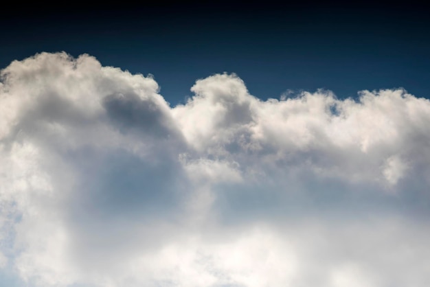 White cloud on dark sky background