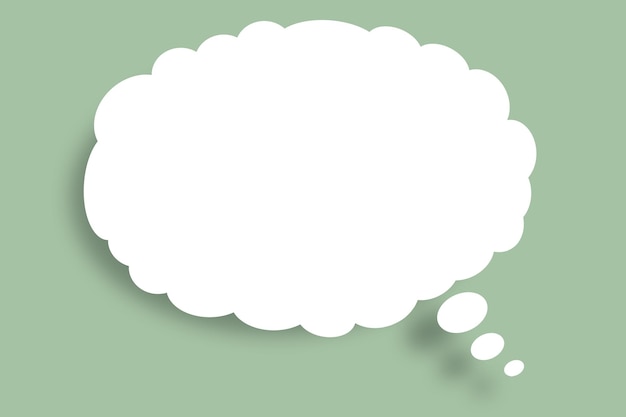 White cloud paper speech bubble shape against light green color background