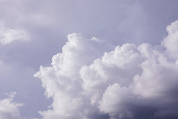 White cloud with blue sky background for design