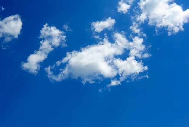 White clouds against the beautiful dark blue sky.