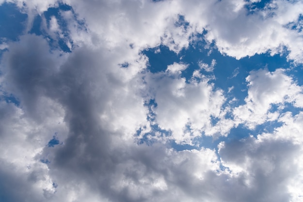 White clouds against blue sky.