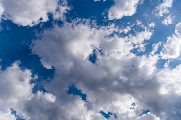 White clouds against blue sky.