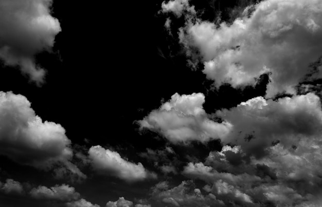 White clouds on black background