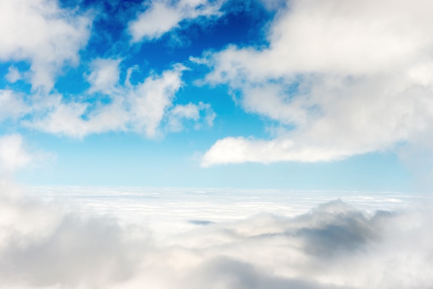 White clouds on the blue sky as nature background