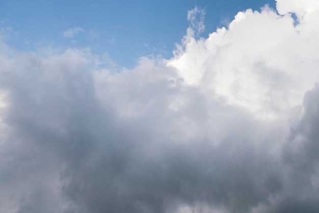 White clouds in the blue sky background