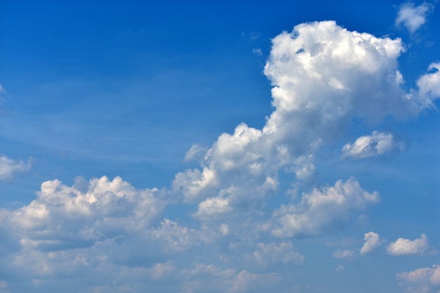 white clouds on the blue sky