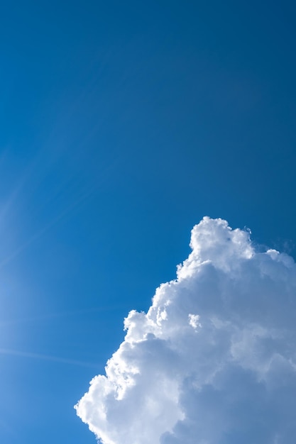 White clouds in the blue sky.