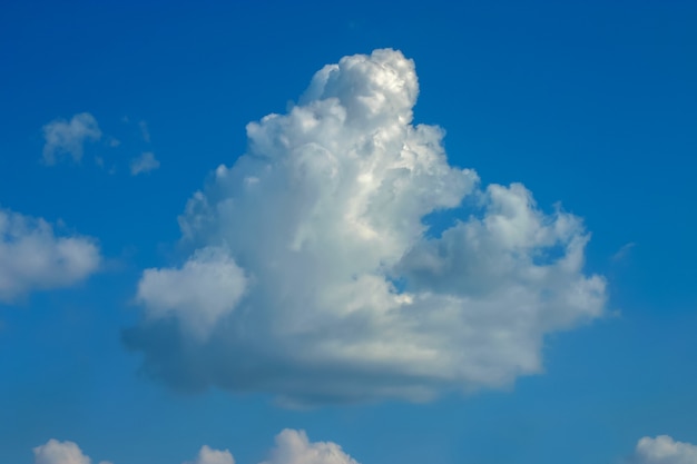 White clouds in the blue sky.