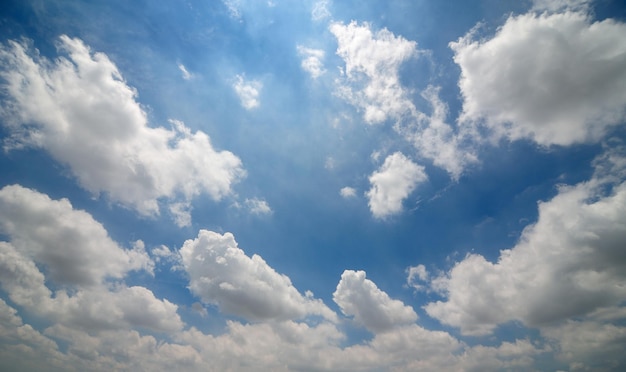white clouds and bright blue sky background