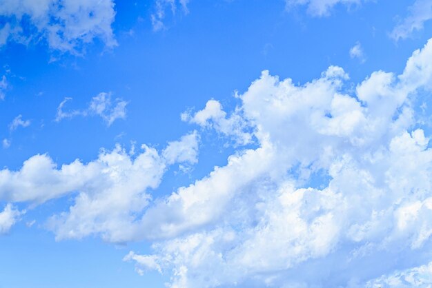 White clouds in a bright blue sky The beauty of the nature