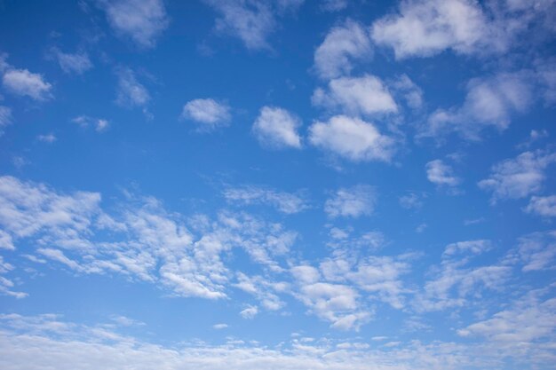 White clouds in a bright blue sky