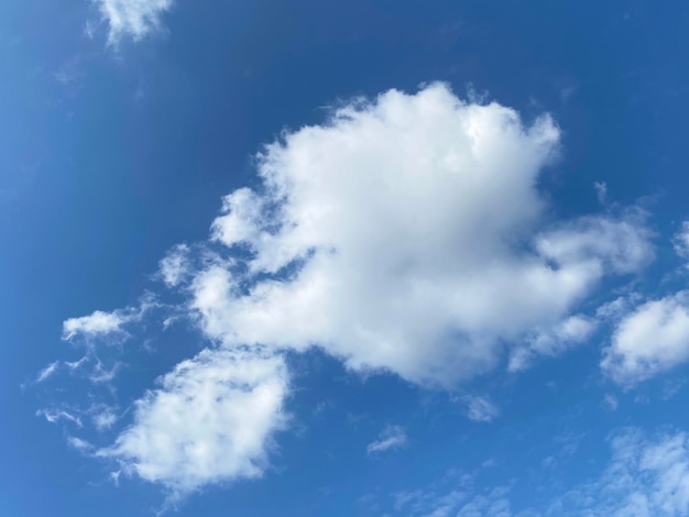 White cloudscape on blue sky background