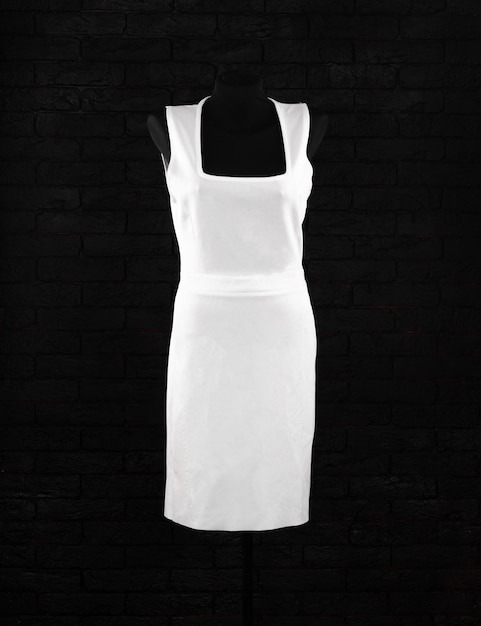 white cocktail fashion dress on a mannequin