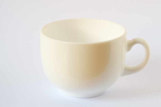 A white coffee cup placed on a white background