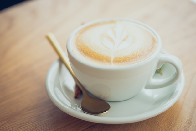 White coffee mug on the wooden table