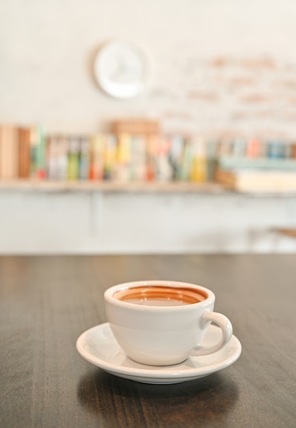 White coffee mug on wooden table