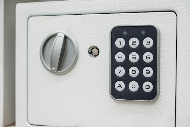 Photo white compact safe with key and combination lock deposit module for storing money and documents