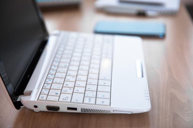 White computer laptop on table