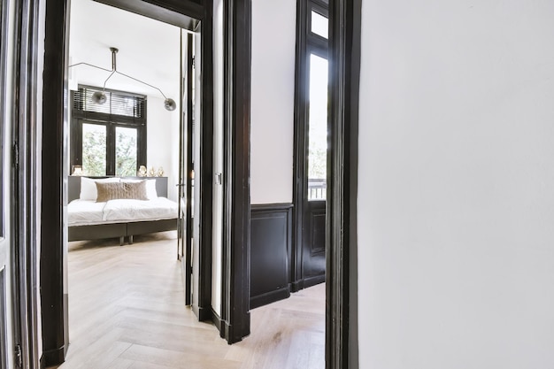 White corridor with black door frames