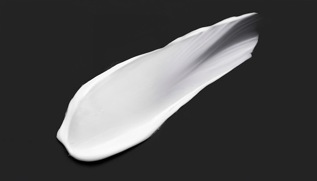 Белый косметический крем изолирован на черном фоне Косметика Макияж Пятно Вид сверху Блеск для губ