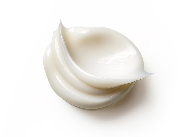 Spuma di crema cosmetica bianca isolata su bianco