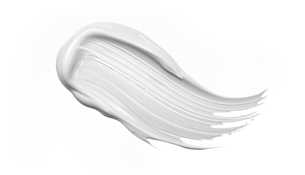 Foto spuma di crema cosmetica bianca isolata su bianco