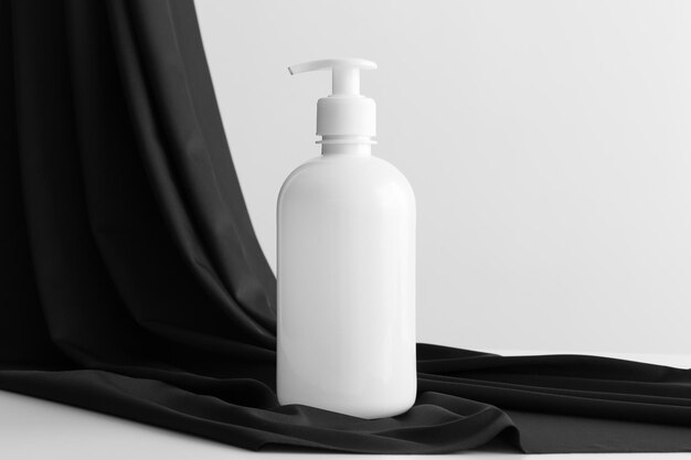 White cosmetic liquid soap dispenser bottle mockup on the yellow textile