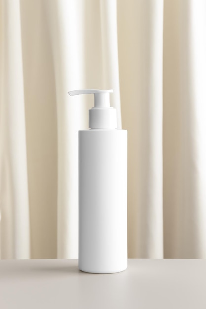 Photo white cosmetic shampoo dispenser bottle mockup with a yellow textile