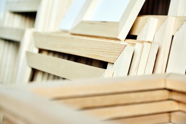 White cotton canvas Wooden stretchers in the background Selective focus