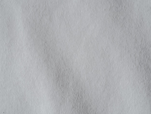 White cotton fabric texture. Clothes cotton jersey background with folds