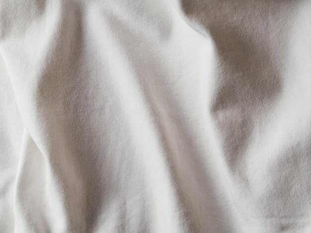 Фото white cotton jersey fabric texture