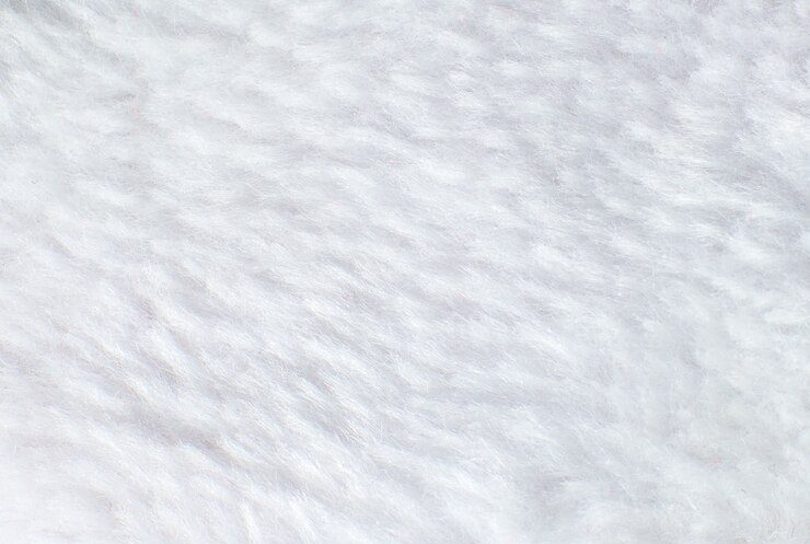Photo white cotton towel or carpet
fluffy texture background. close up photo.