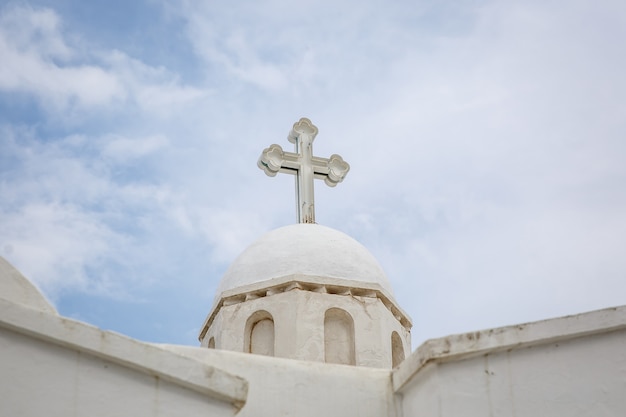 White cross on a greek church