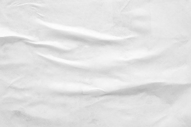 White crumpled and creased paper poster texture background