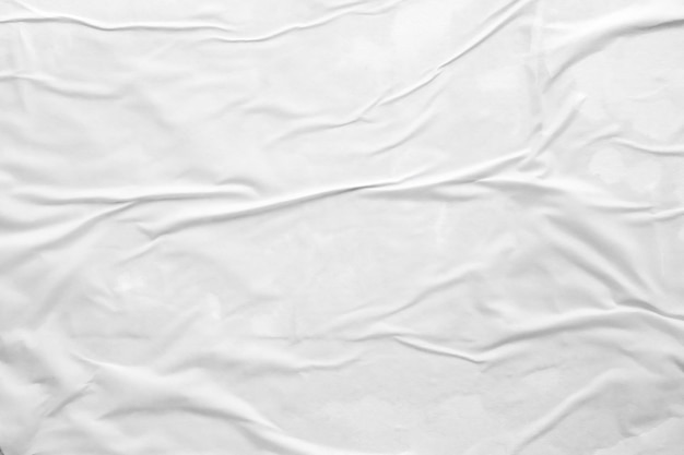 White crumpled and creased paper poster texture background