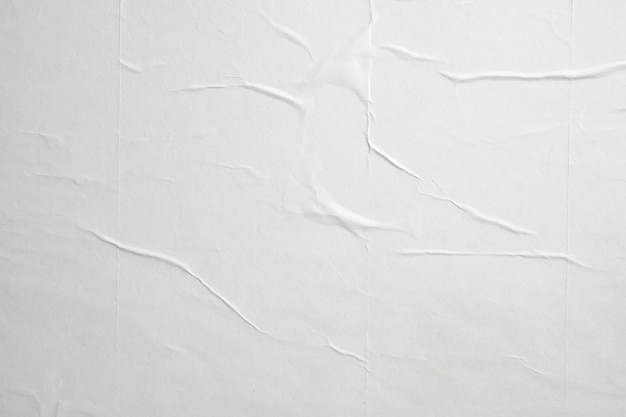 White crumpled and creased paper poster texture background