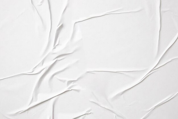 white crumpled and creased paper poster texture background