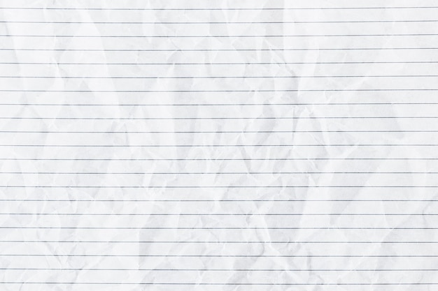 White crumpled lined paper background