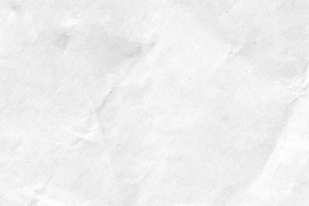 Photo white crumpled paper texture background. close-up.