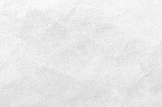 Photo white crumpled paper texture background. close-up.