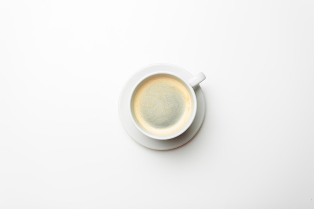 White cup of coffee isolated on the white background