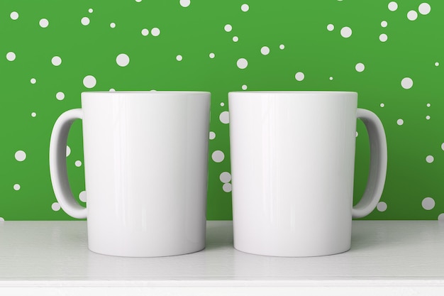 Макет белой чашки на зеленом фоне