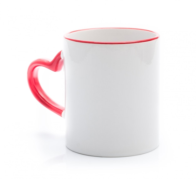 White cup with red handle in heart shape