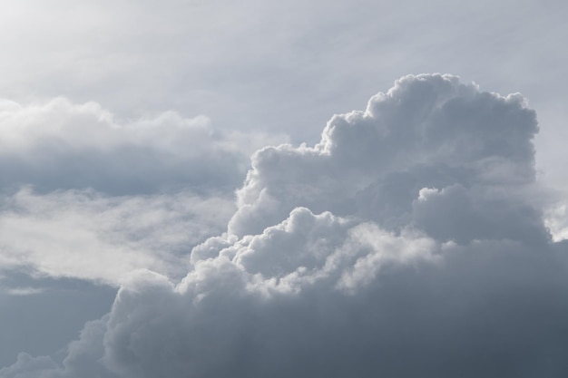 White curly clouds on a gentle blue sky