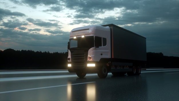 White delivery truck on asphalt road at sunset