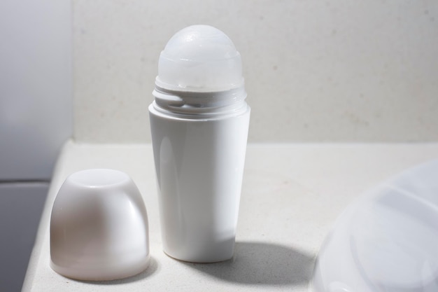 White deodorant ball container with space for branding