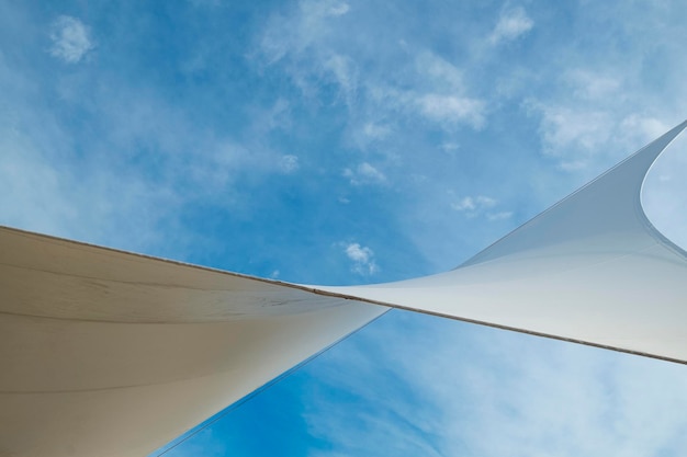 Photo white detail of big top tent against a blue an cloudy sky alicante costa blanca spain