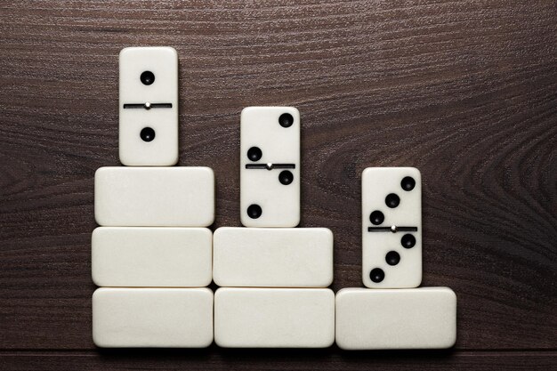 white domino pieces win concept background